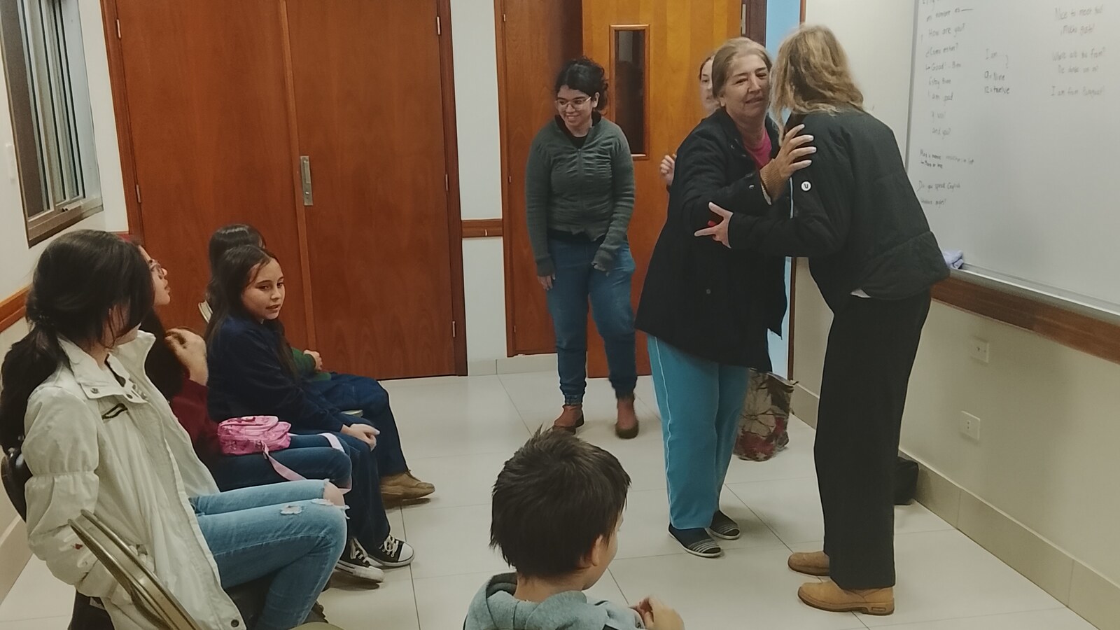 Sam seated with other participants during a weekly English class at his church in Paraguay.